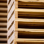 A stack of wooden pallets stacked on top of each other.